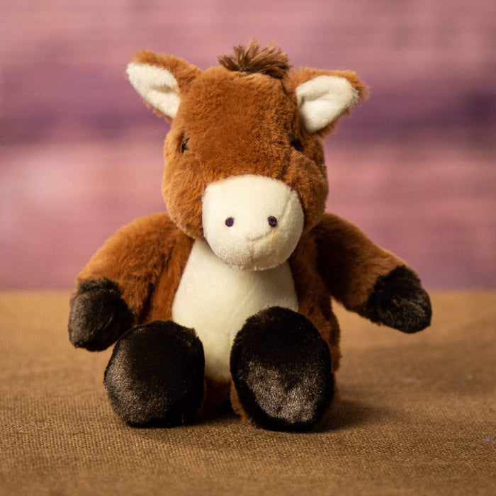 A brown horse that is 11 inches tall while standing