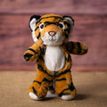 A stripped tiger that is 11 inches tall while standing
