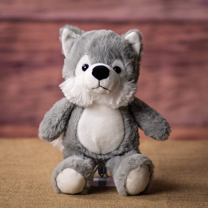 A grey wolf that is 11 inches tall while standing