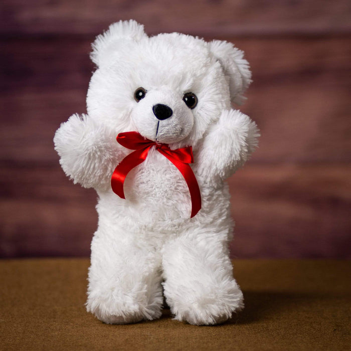 A white bear that is 14 inches tall while standing