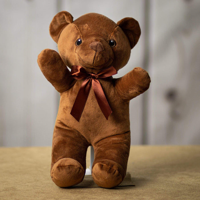 A brown bear that is 14 inches tall while standing