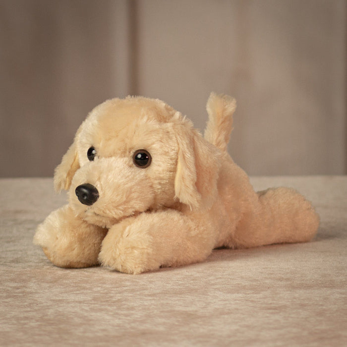 8 inch long laying yellow Labrador pupyl