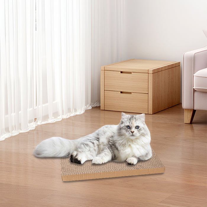 Reversible cat scratching board in natural beige, featuring a textured surface and a cozy cat lounging on it.