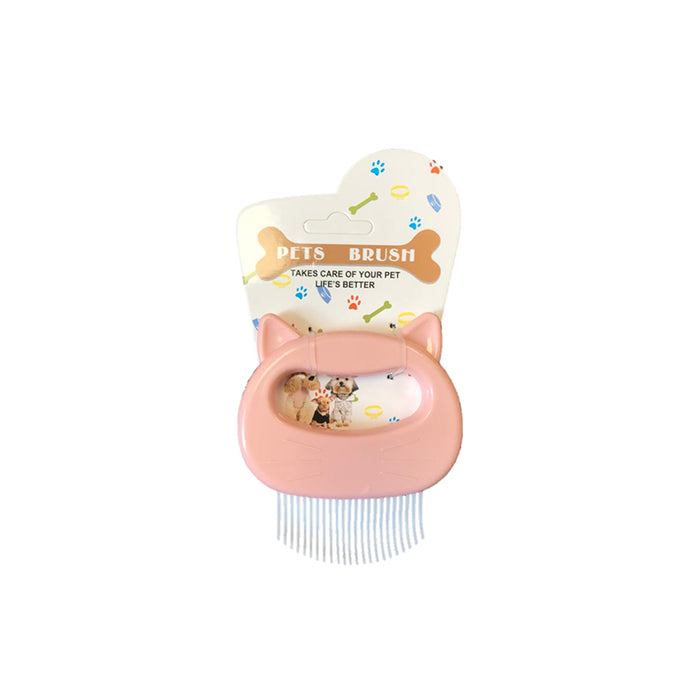 A pink cat-shaped grooming brush with a soft grip and fine bristles, displayed on a colorful, patterned backing.