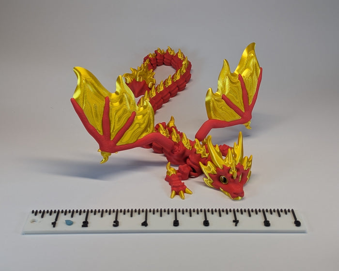 Firestorm Dragon With Wings Red and Gold Wings Spread With Ruler