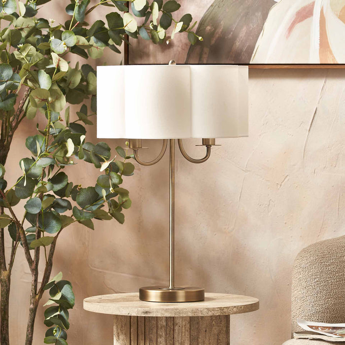 Mariana Matt Antique Brass and White Scallop Shaded Table Lamp