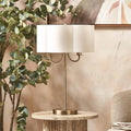 Mariana Matt Antique Brass and White Scallop Shaded Table Lamp