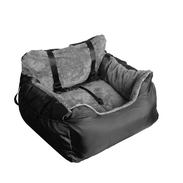 A large black plush car booster seat with a soft gray lining and safety straps, designed for pet travel comfort.