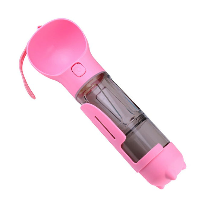 Portable pink water bottle with a food dispenser feature, made of durable plastic and designed for convenience.