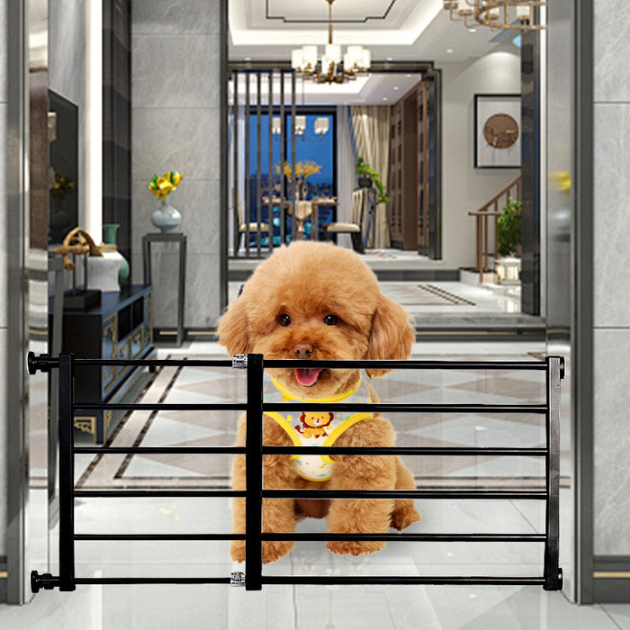 Black retractable pet safety gate displayed with a fluffy dog in a stylish indoor setting.
