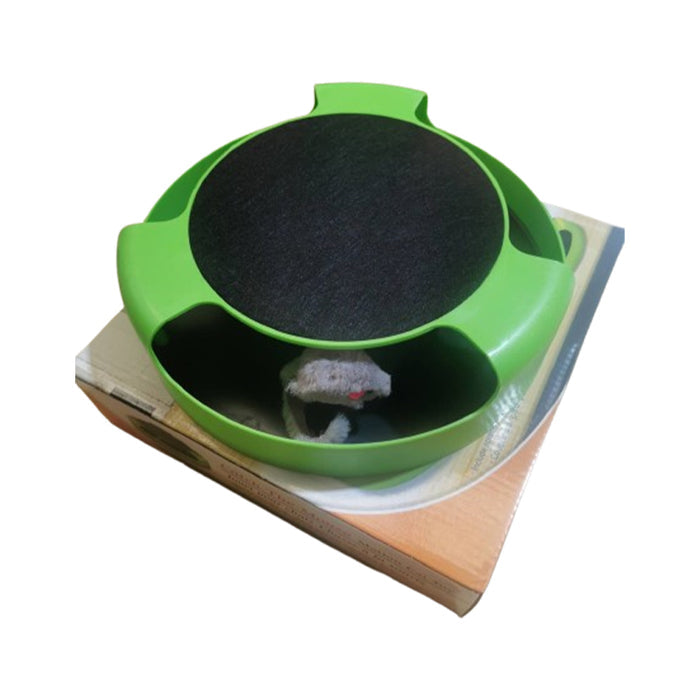 Circular green scratch board featuring a black scratching surface and an interactive plush mouse underneath.