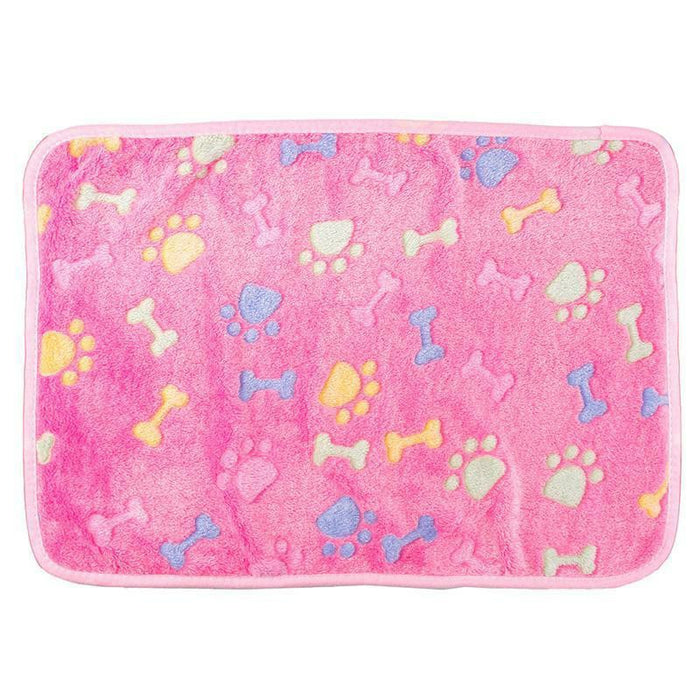 Soft pink pet mat with a plush texture, featuring colorful bone and paw print patterns.